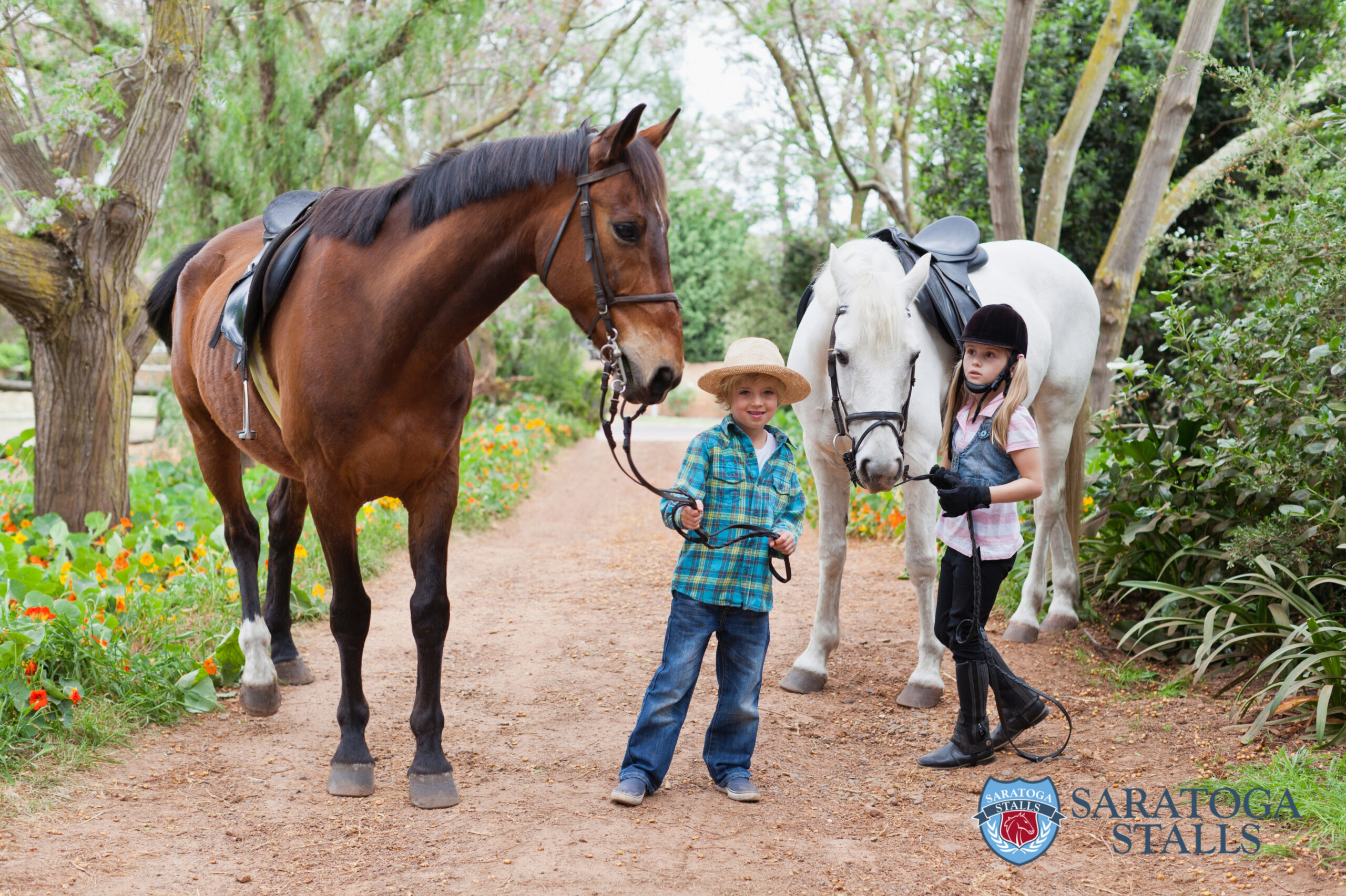 Children dressing up for Halloween with horses.