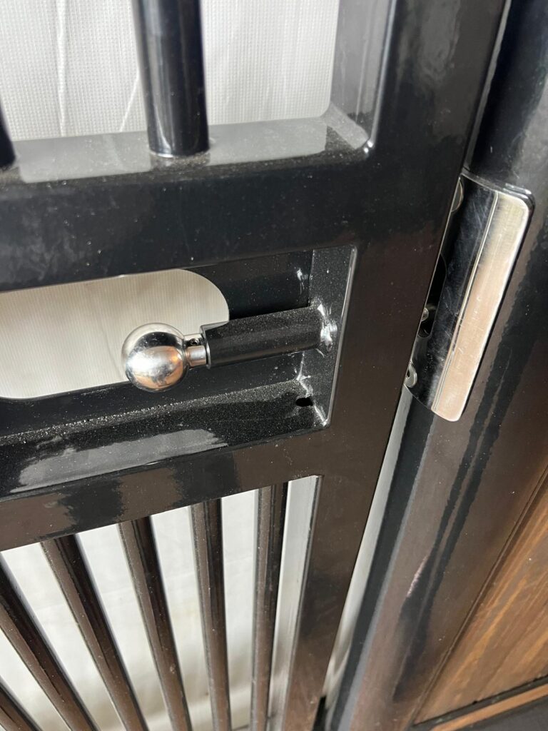 Plunge latch on a hinged stall.