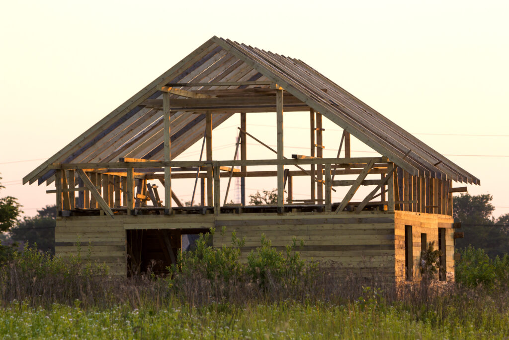 Wood barn being constructed